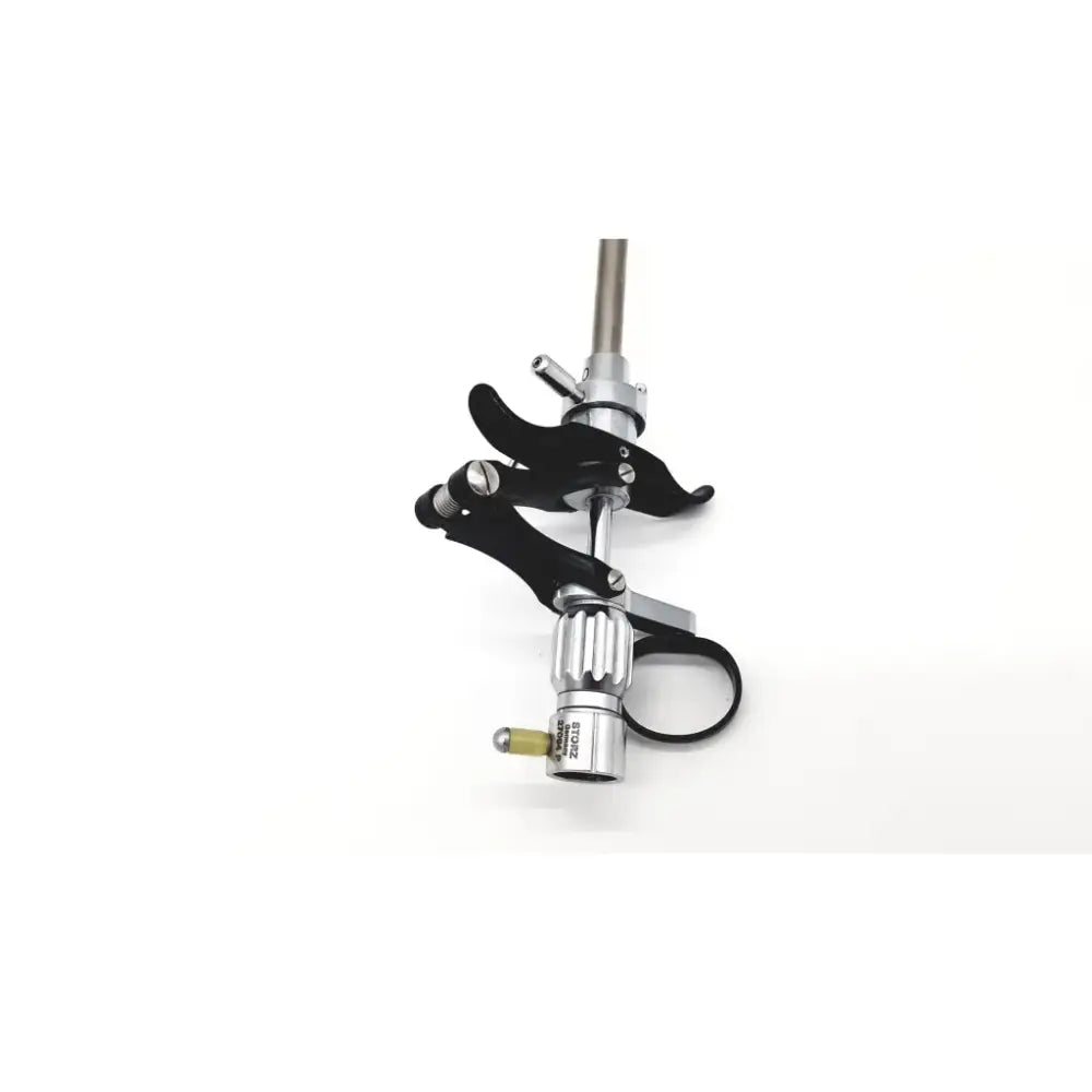 Black and silver karl storz 27094p optical kidney stone grasper with textured grip and adjustable clamping mechanism