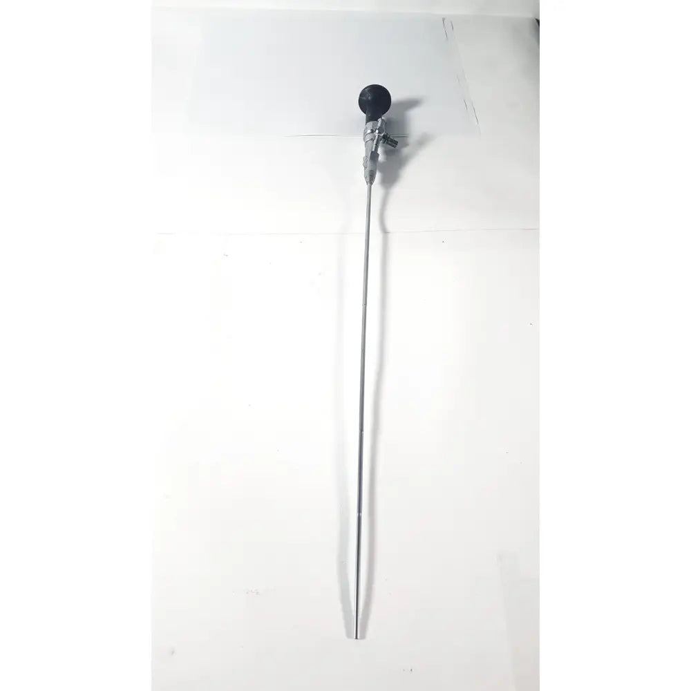 A sleek metallic karl storz autoclavable rigid scope dual channel with a black spherical tip and silver shaft