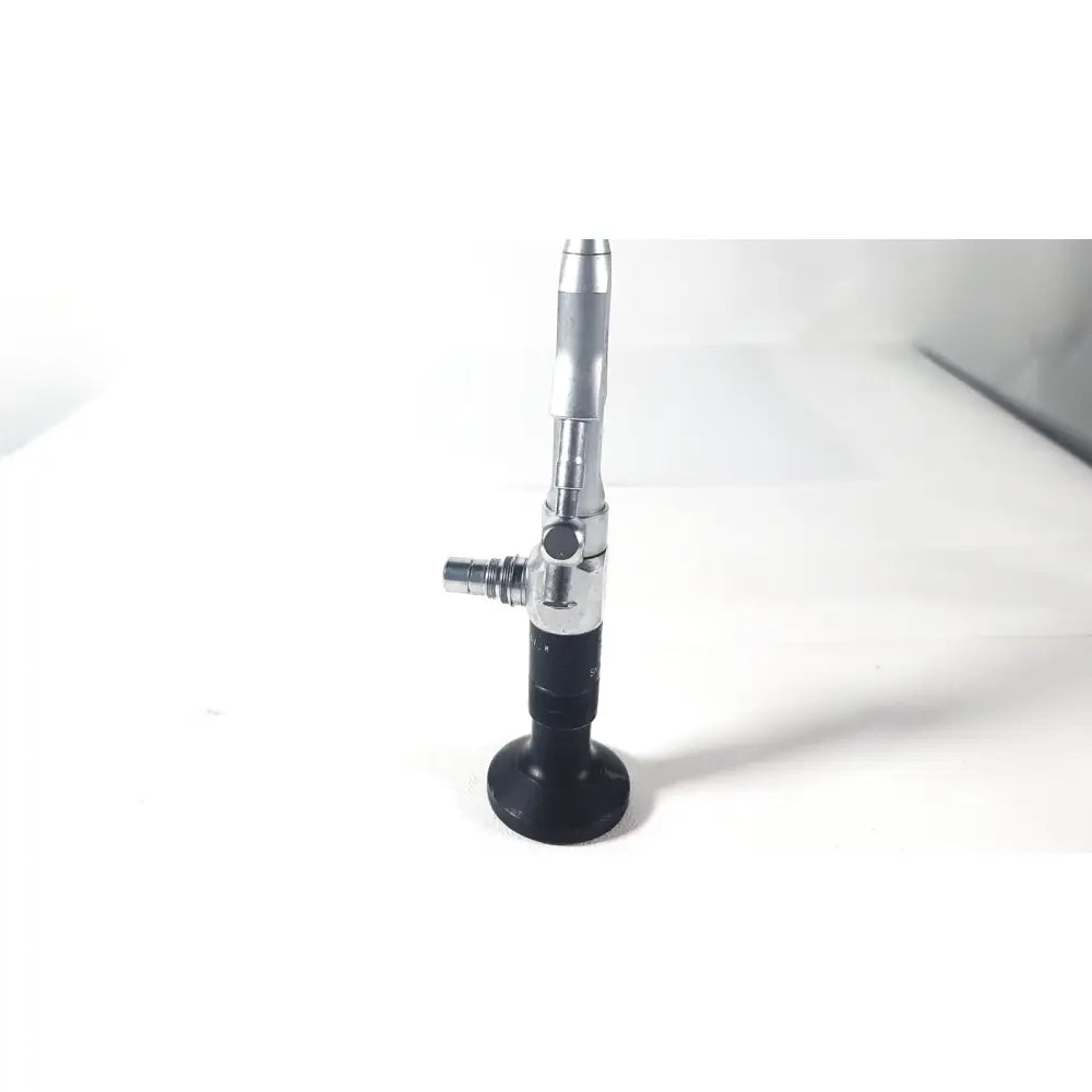 Silver and black karl storz 27410 sk 7.5fr autoclavable rigid scope dual channel with sleek cylindrical handle and articulated shaft