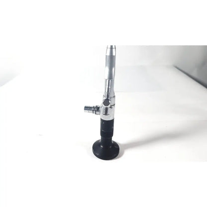 Silver and black karl storz 27410 sk 7.5fr autoclavable rigid scope dual channel with sleek cylindrical handle and articulated shaft