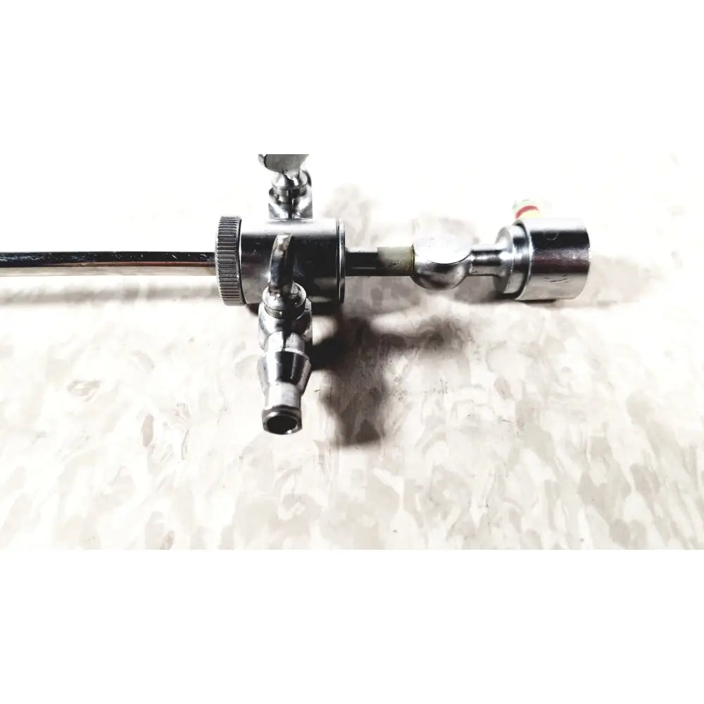 Shiny chrome medical gas regulator with threaded connections and knurled adjustment knob for karl storz 28124cr cannula