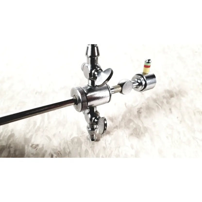 Shiny chrome storz 28124cr cannula with long slender shaft and multiple adjustable knobs for surgical use