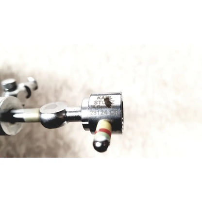 Metallic karl storz 28124cr cannula with dual rotating stopcocks and striped cylindrical tip surgical sheath