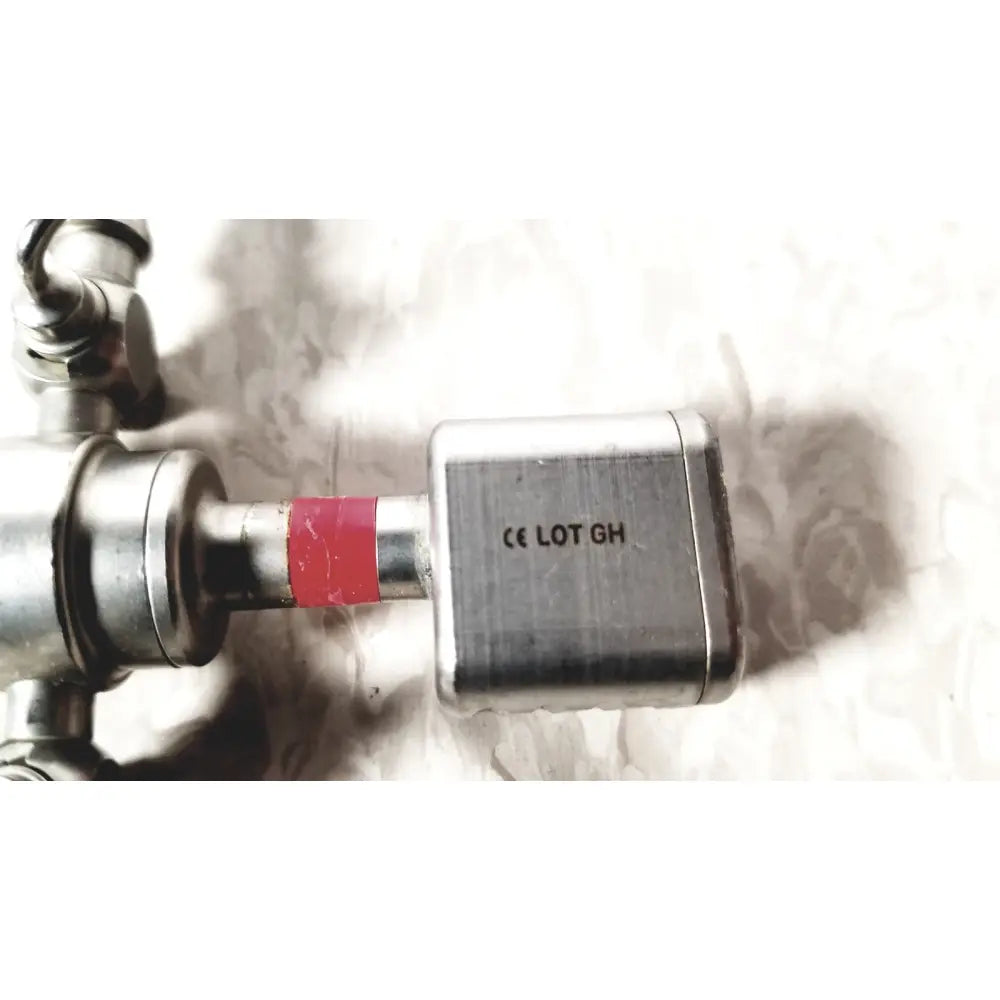 Silver metallic valve with red band and engraved ce lot gh marking on karl storz 28128 diagnostic arthro sheath