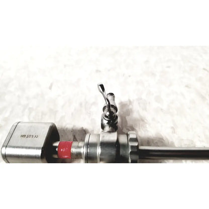 Silver karl storz diagnostic arthro sheath with red band and engraved markings for surgical use