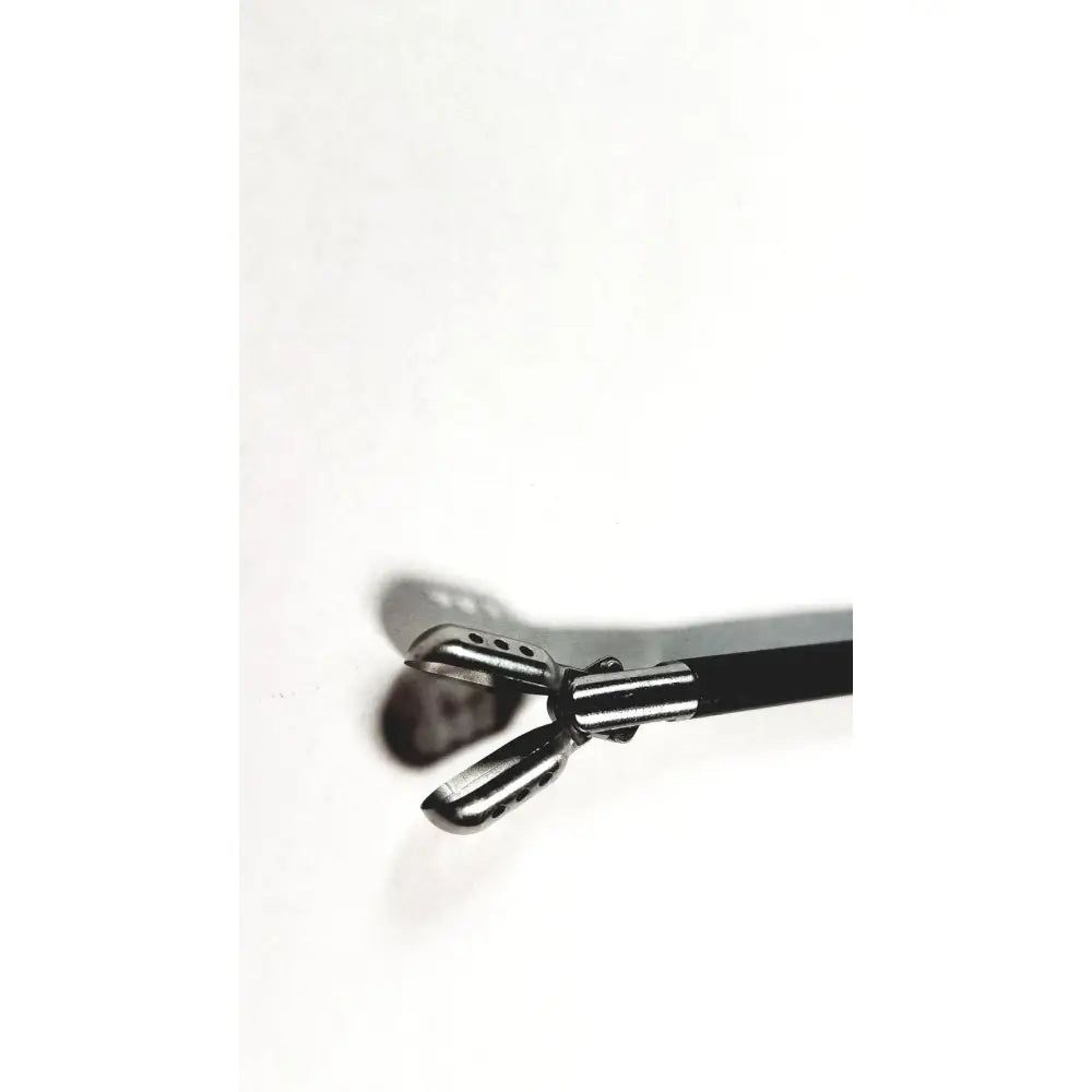 Black-handled karl storz clickline handle with metallic four-pronged perforated tip for laparoscopic instruments