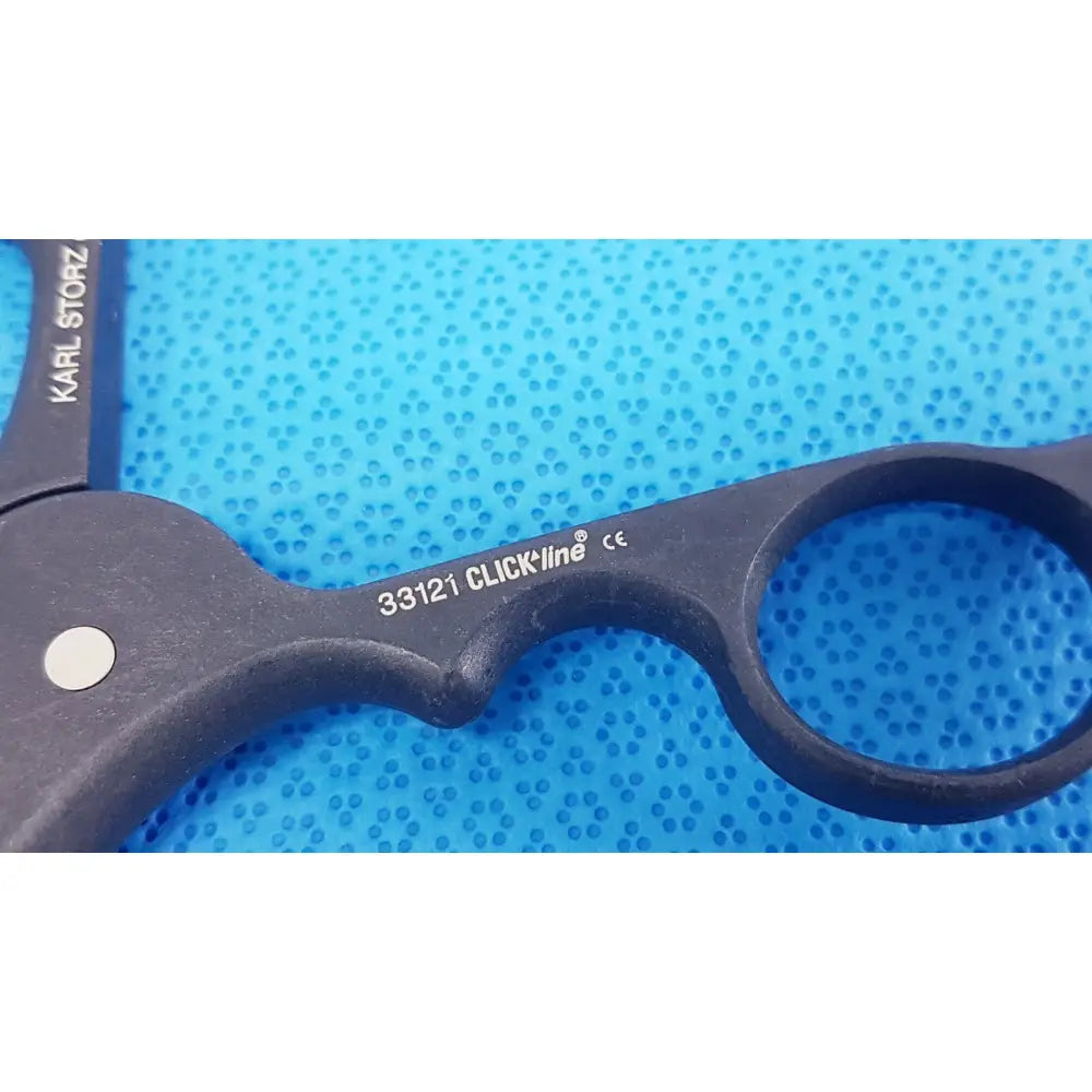 Black plastic monopolar plastic handle with karl storz and 33121 clickline engraving for laparoscopic use
