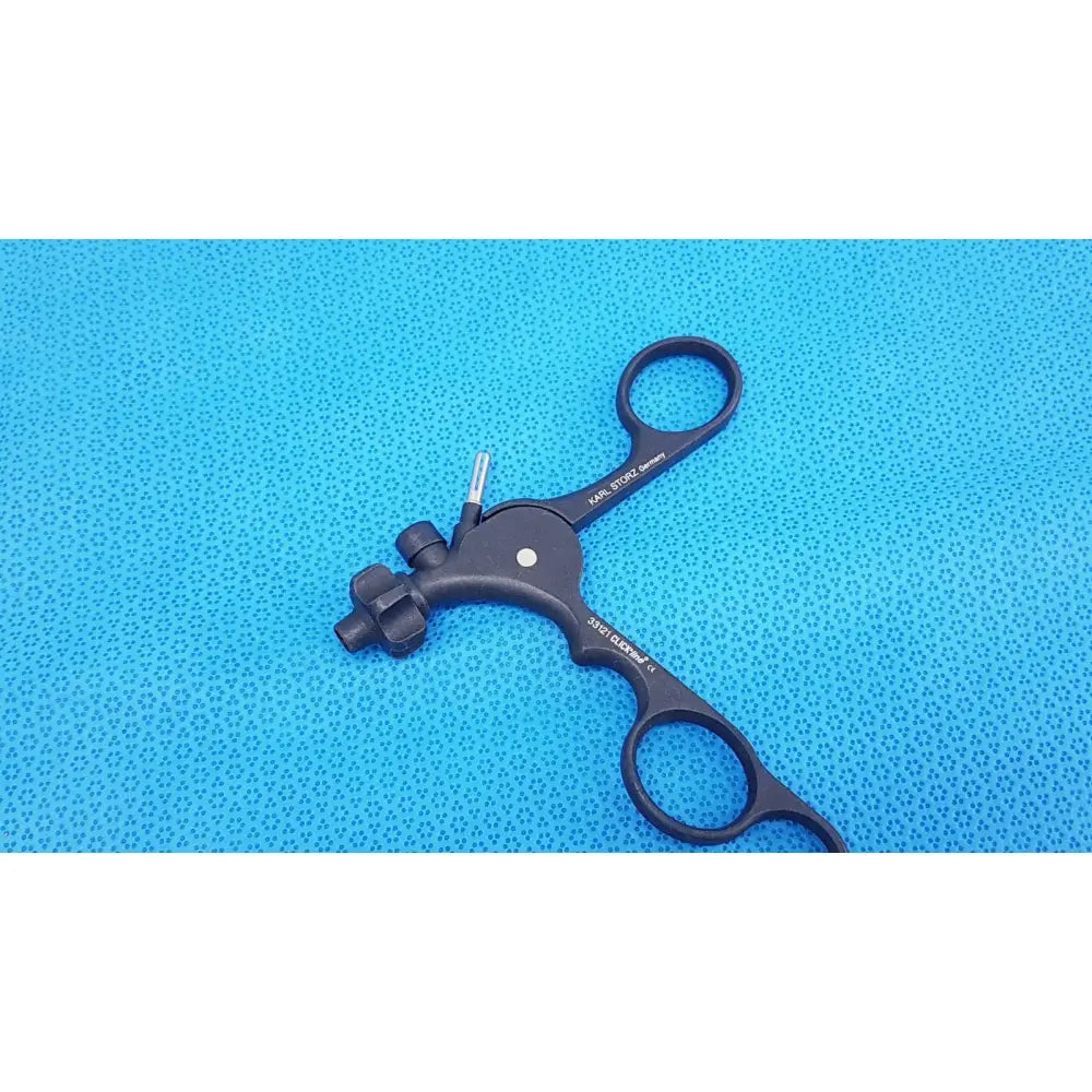 Black karl storz clickline monopolar plastic handle laparoscopic instrument with two handles and central mechanism