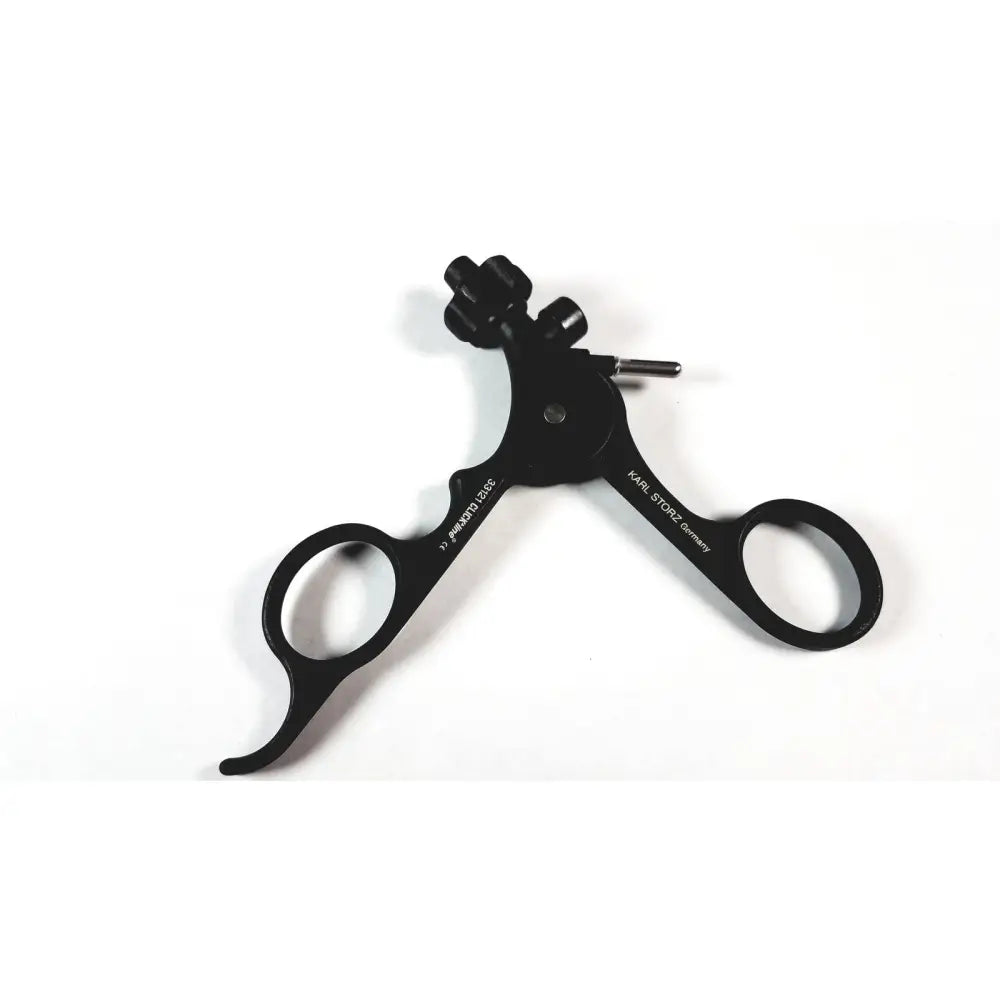 Black karl storz endoscopic surgical instrument with clickline plastic handle and ergonomic precision-engineered tip