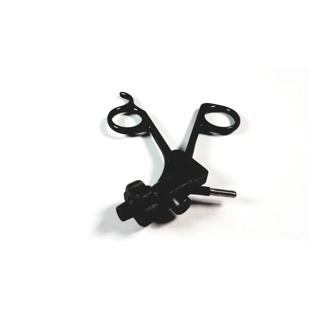 Black surgical instrument with clickline plastic handle pistol grip and curved handles by karl storz for endoscopy use