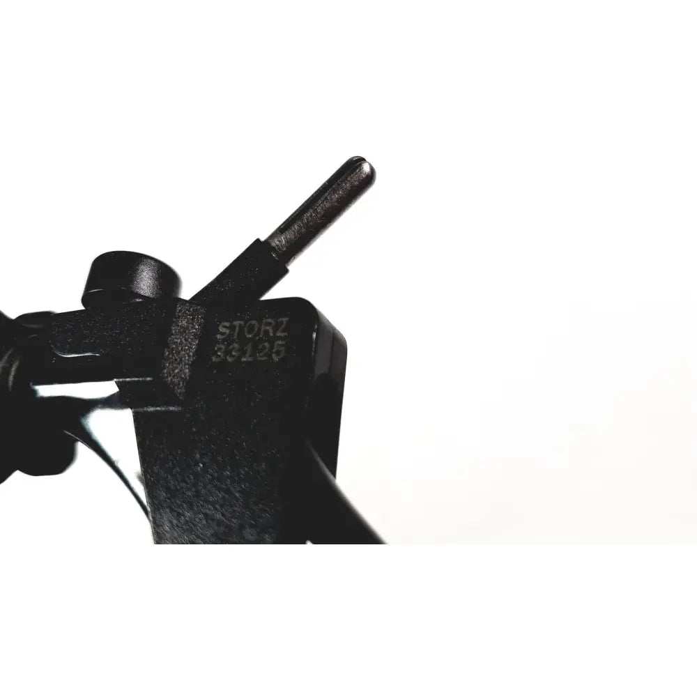 Karl storz 33121 clickline plastic handle pistol grip endoscopy tool with matte finish and metallic needle-like protrusion