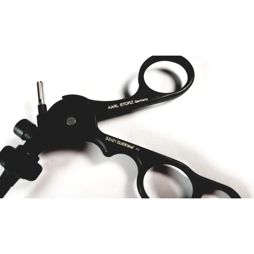 Black Karl Storz 33121 endoscopy handle with ergonomic handles and metallic pivot points for medical equipment use