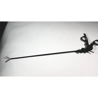 Black karl storz endoscopy handle with long shaft and curved looped handles for precise surgical medical equipment use