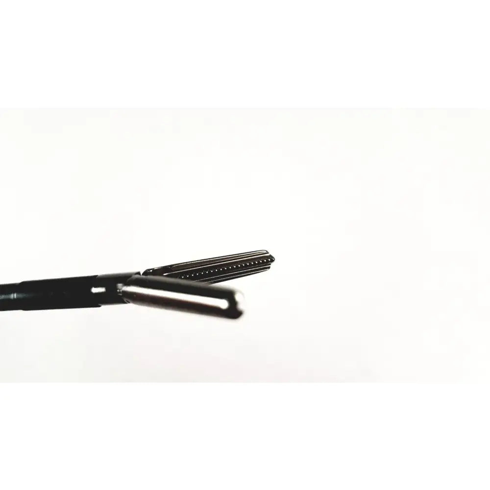 Black karl storz endoscopy handle with metallic serrated tip and textured handles for surgical medical equipment use