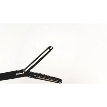 Black-handled karl storz endoscopy handle with metallic serrated jaws for precise surgical medical equipment use