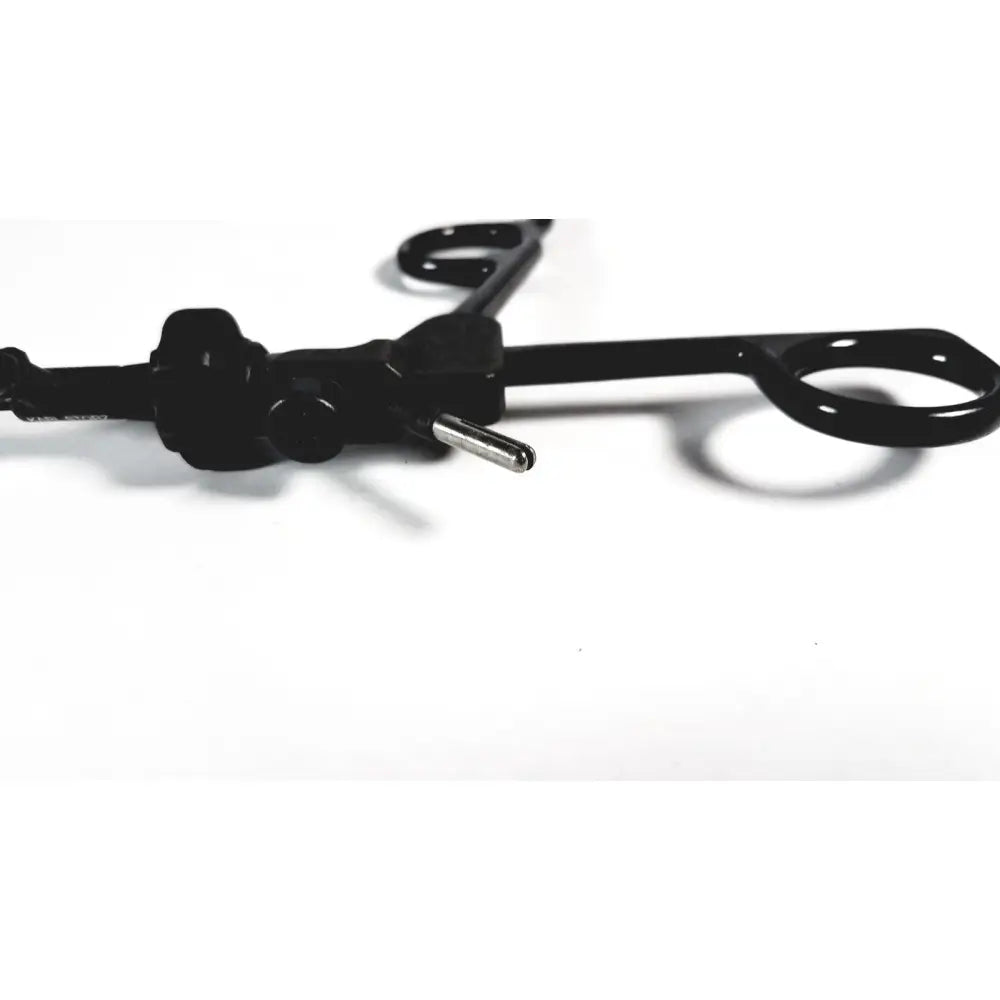 Black karl storz clickline handle with metallic tip and insulated shaft laparoscopic tool for surgical use