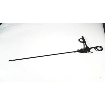 Black Karl Storz clickline handle with insulated shaft laparoscopic tool featuring a long slender shaft and articulated handles