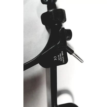 Black plastic monopolar surgical handle karl storz 33125 with engraved branding and model number visible