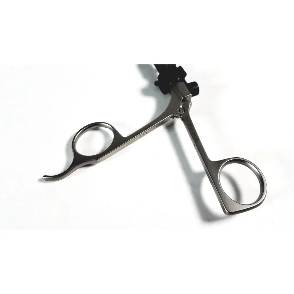 Stainless steel karl storz clickline handle shaft laparoscopic surgical tool with black ergonomic handles and engraved markings