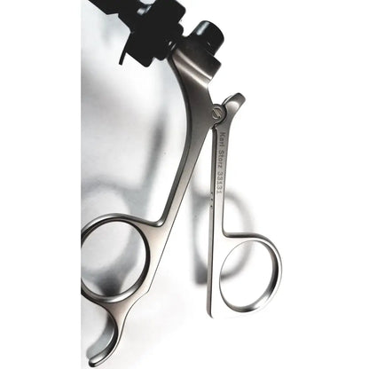 Stainless steel karl storz clickline handle with black ergonomic grips and engraved brand name for shaft laparoscopic surgical use