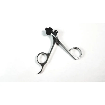 Silver karl storz clickline metal handle surgical instrument with black adjustment knobs and ergonomic pistol grip design