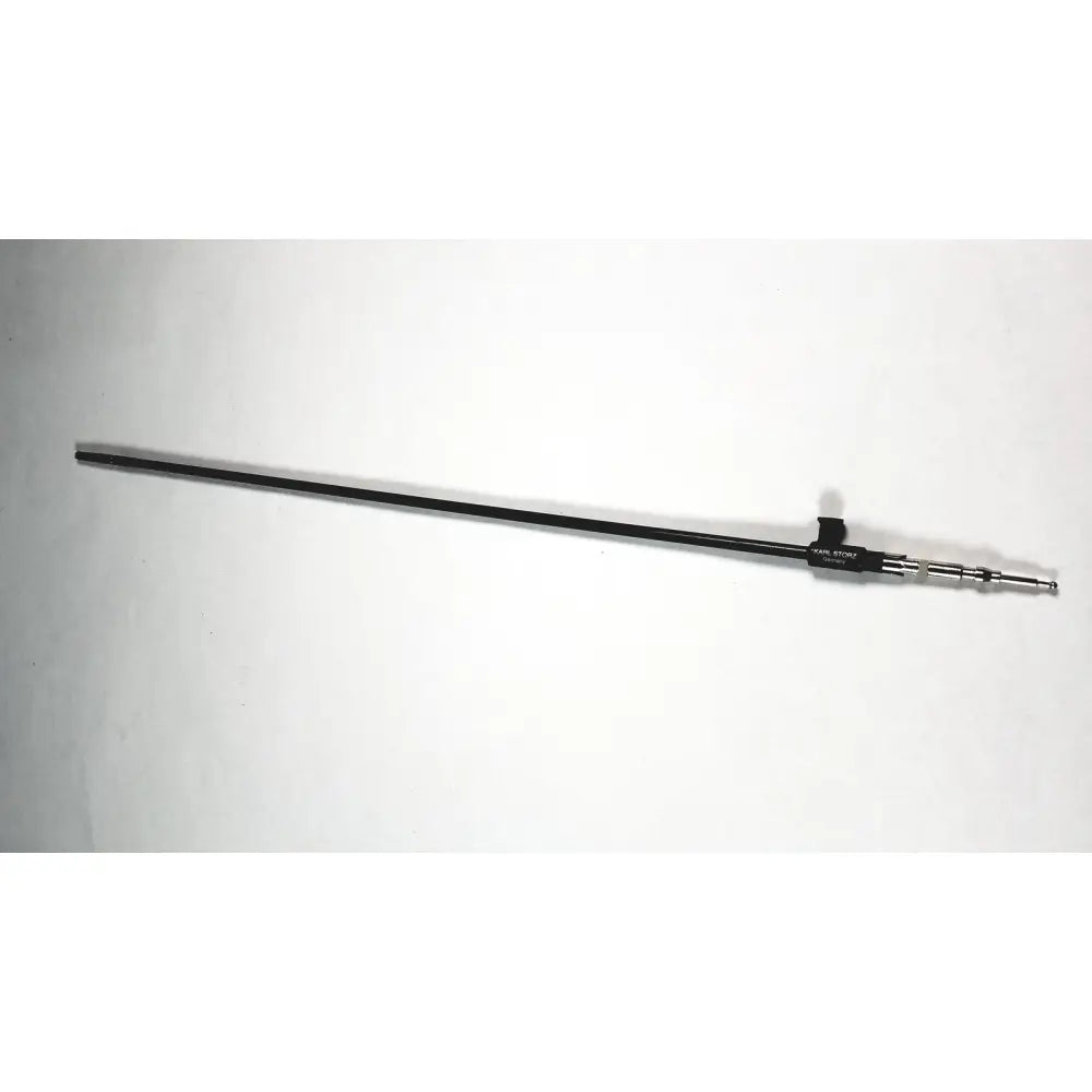 Black karl storz 33300mw clickline scissors insert endoscopic tool with sleek body and metallic joints near the tip
