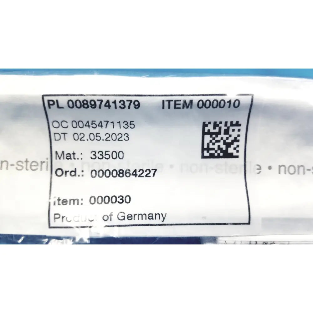 White plastic label with black text and qr code on karl storz 33500 clickline insulated outer sheath tube showing product details