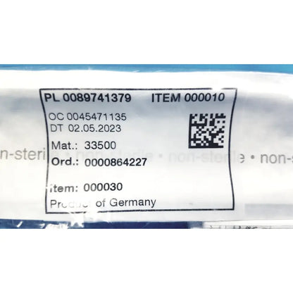 White plastic label with black text and qr code on karl storz 33500 clickline insulated outer sheath tube showing product details