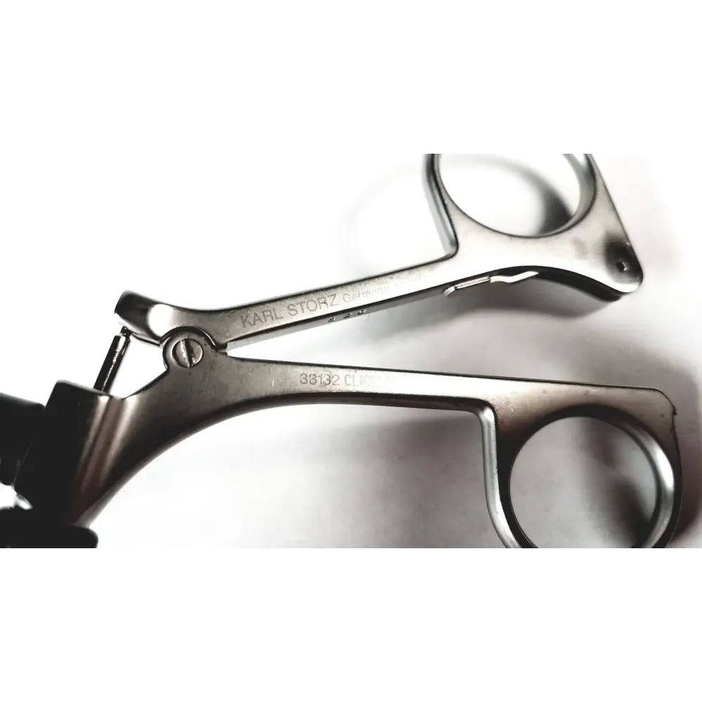 Stainless steel karl storz clickline shaft laparoscopic surgical forceps with polished finish and engraved branding
