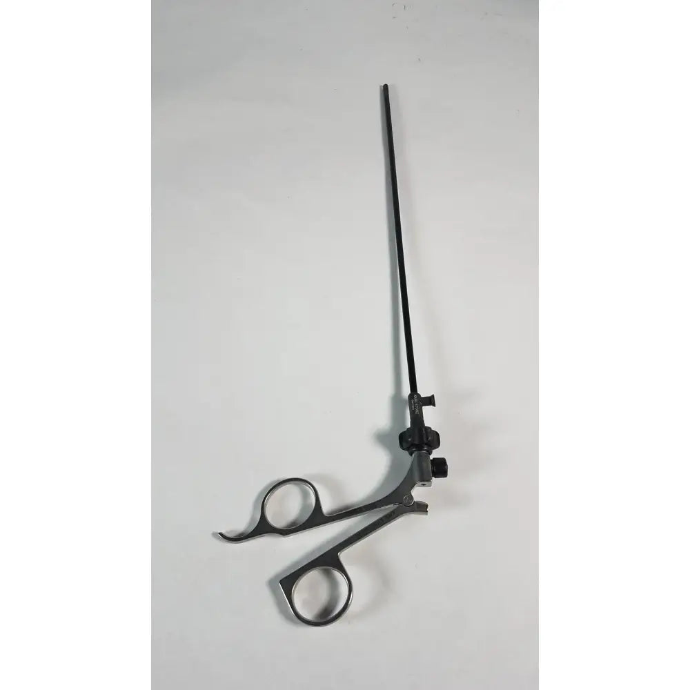 Black karl storz clickline surgical instrument with articulated handles and long slender shaft for precision use
