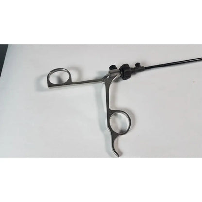 Silver karl storz clickline surgical instrument with sleek metallic finish and dual-ring handles for precision use