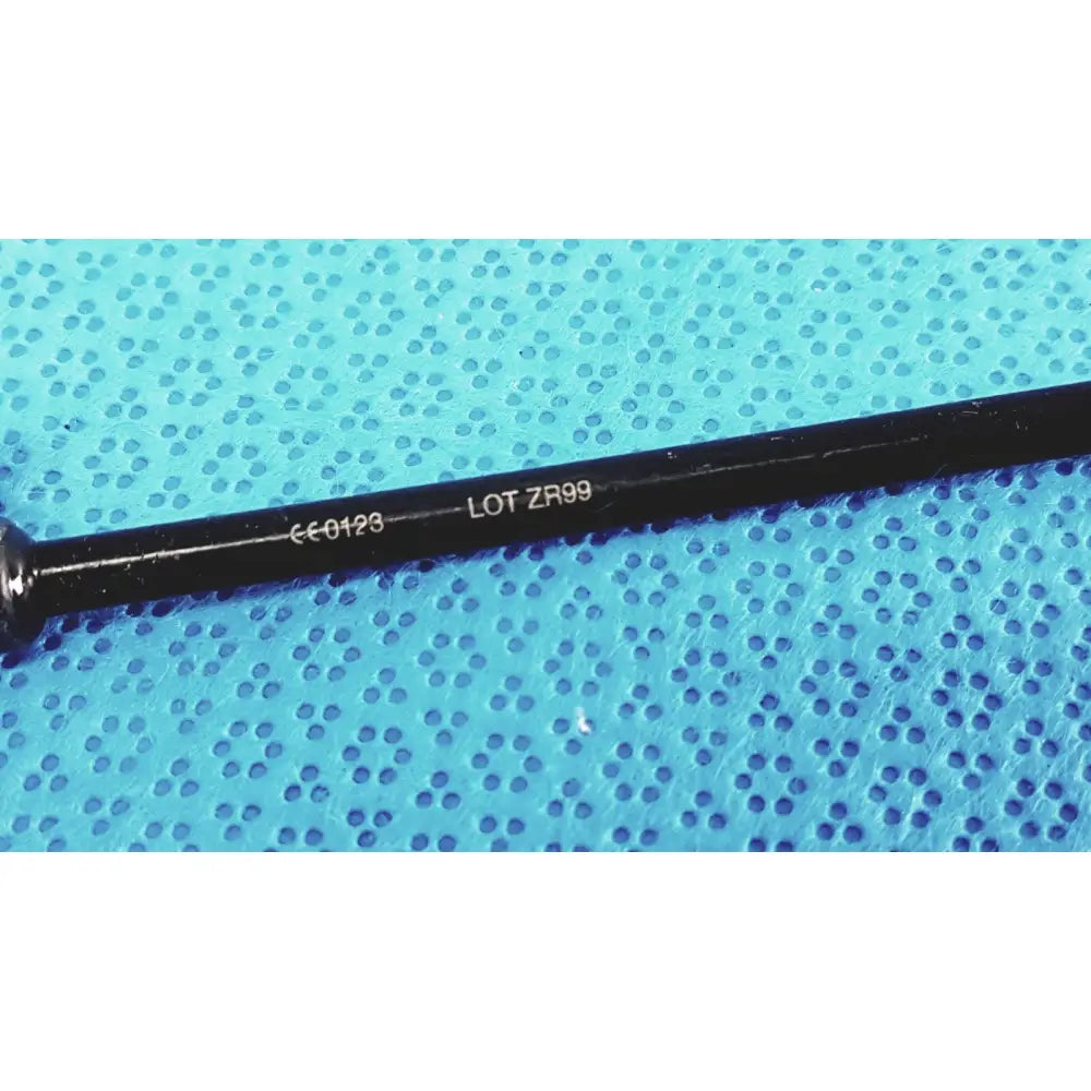 Black cylindrical insulated outer sheath rod with engraved markings ce 0128 and lot zr99 for karl storz clickline
