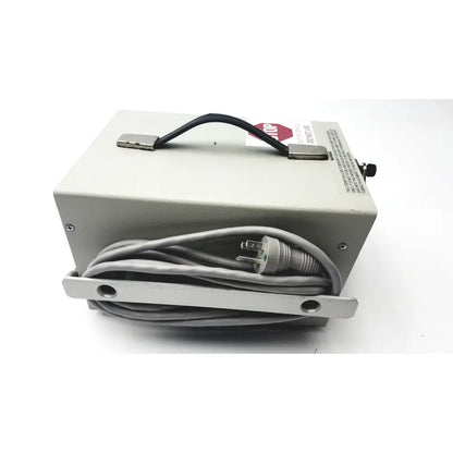 Gray metal industrial power supply unit with black handle and coiled cable for karl storz endoscopy 27224p pump