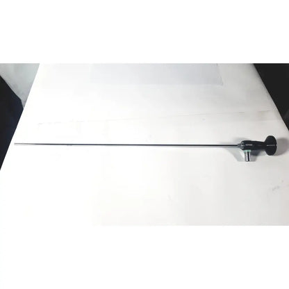 Black-handled karl storz hopkins 10327 A 0 degree arthroscope with long slender metallic shaft for surgical use