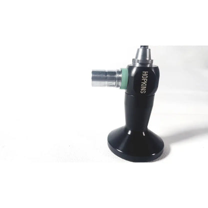 Black karl storz hopkins surgical torch with metallic nozzle and green accent ring for arthroscopic procedures