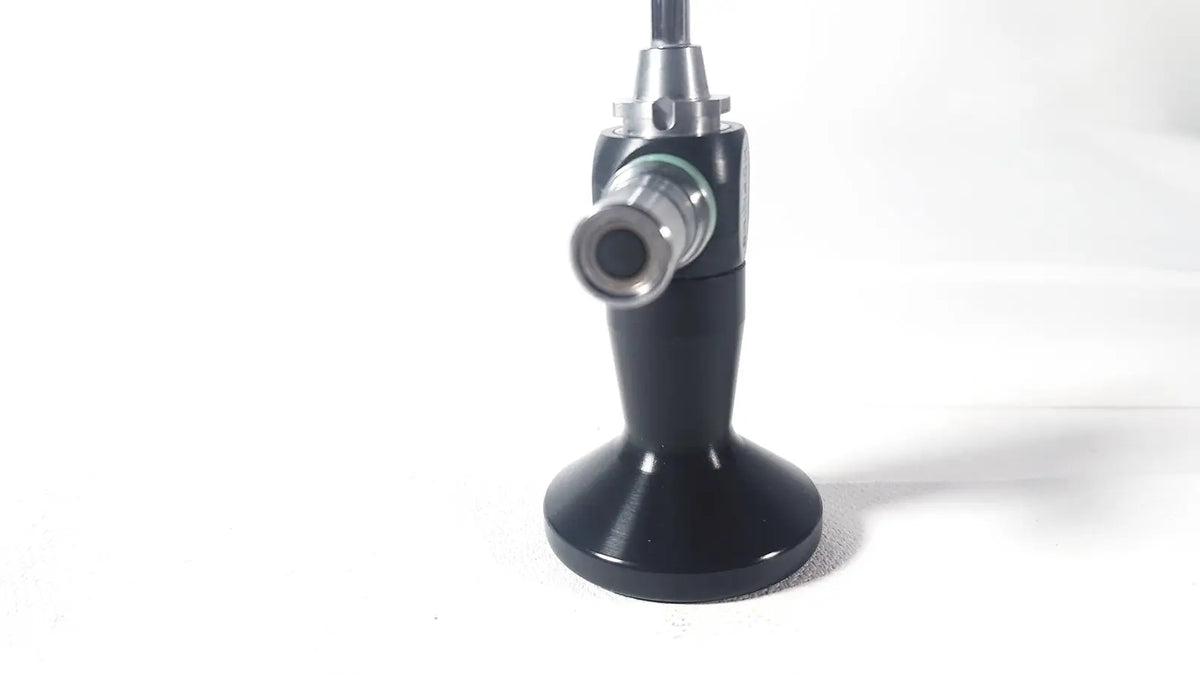 Black ergonomic handle with metallic joint and lens assembly of Karl Storz Hopkins 10327 A 0 degree arthroscope designed for medical use