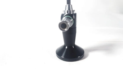Black ergonomic handle with metallic joint and lens assembly of Karl Storz Hopkins 10327 A 0 degree arthroscope designed for medical use