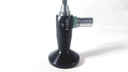 Black karl storz hopkins 10327 a 0 degree arthroscope with silver metallic joints and green accent ring