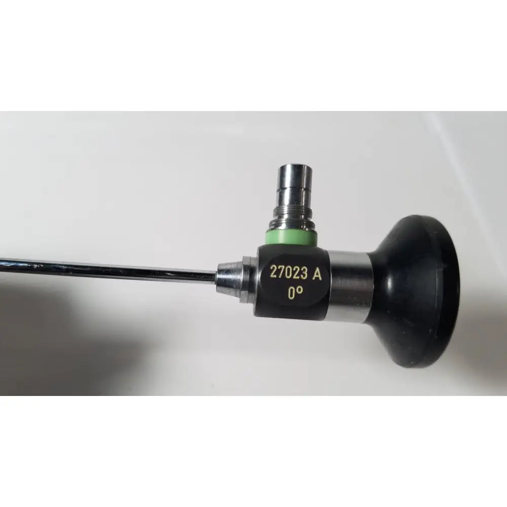 Black and silver karl storz hopkins 27023 a 0 degree endoscope with green ring for medical use
