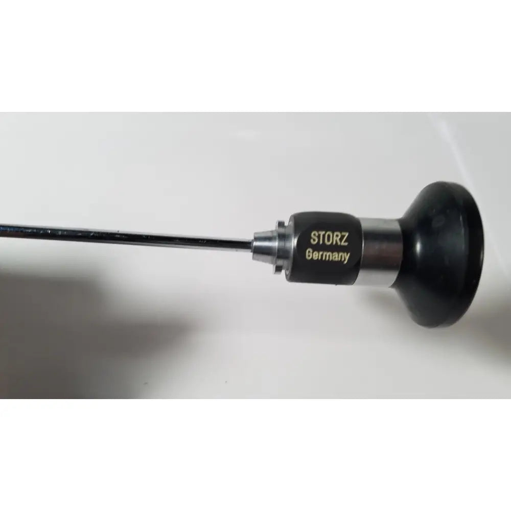 Black and silver Karl Storz Hopkins 27023 A 0 degree endoscope with sleek cylindrical design for precision imaging