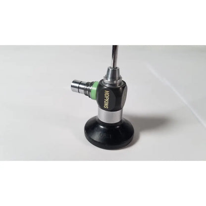 Black and silver karl storz hopkins 27023 a 0 degree endoscope with green accent ring for surgical use