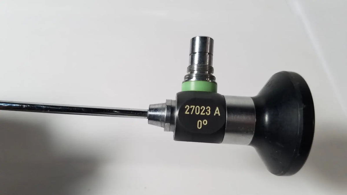 Black and silver karl storz hopkins 27023 a 0 degree endoscope with green ring for medical use