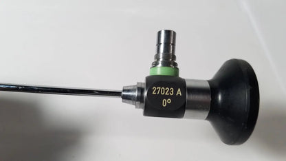 Black and silver karl storz hopkins 27023 a 0 degree endoscope with green ring for medical use