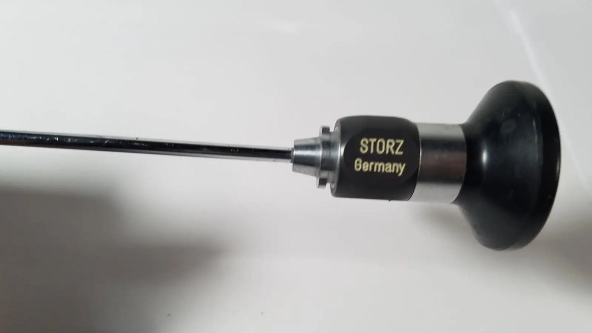 Black and silver Karl Storz Hopkins 27023 A 0 degree endoscope with sleek cylindrical design for precision imaging