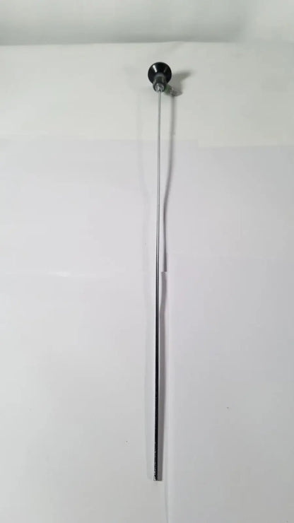 A sleek metallic rod with a polished black spherical knob from the karl storz hopkins 27023 a 0 degree endoscope