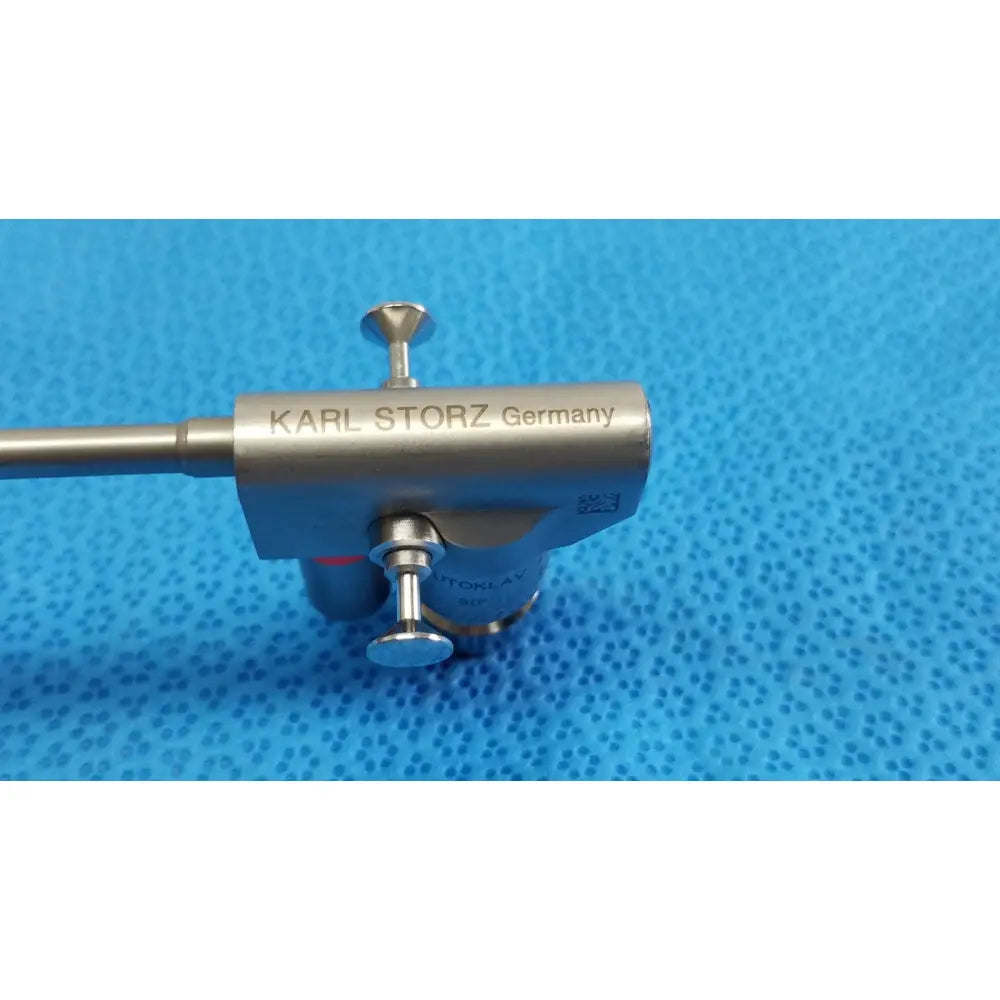 Silver metallic karl storz hopkins 30º autoclavable telescope with engraved branding and two adjustable knobs