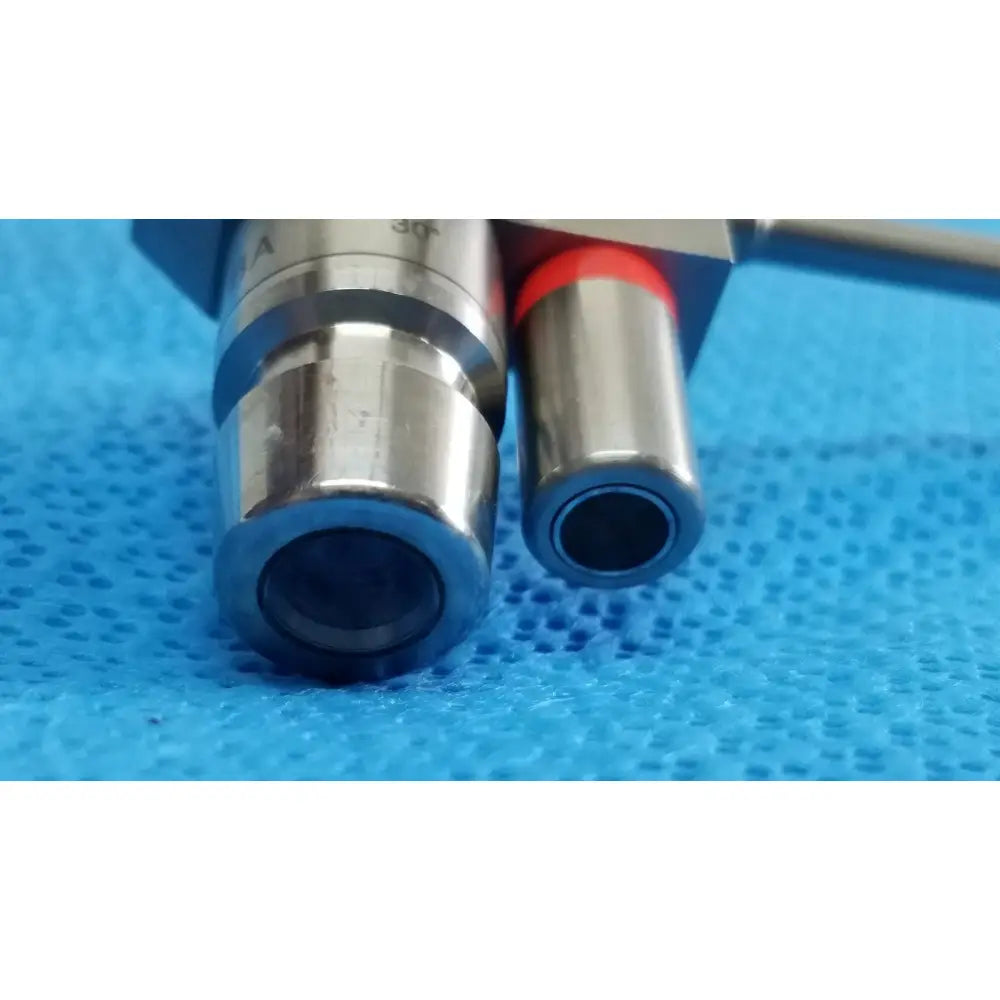Silver karl storz hopkins 30º autoclavable telescope with red accent and metallic finish surgical instrument