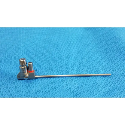 Silver surgical telescope with long slender metallic shaft and two cylindrical heads karl storz hopkins 30º autoclavable