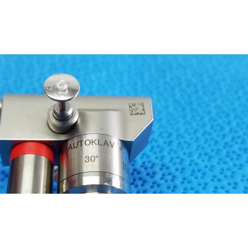 Silver metallic karl storz hopkins 30º autoclavable telescope with red-capped tubing and 30-degree angle autoklav sterilizer