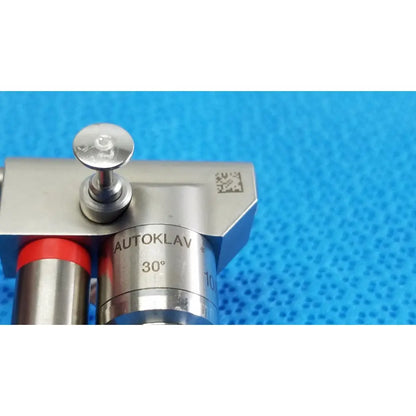 Silver metallic karl storz hopkins 30º autoclavable telescope with red-capped tubing and 30-degree angle autoklav sterilizer